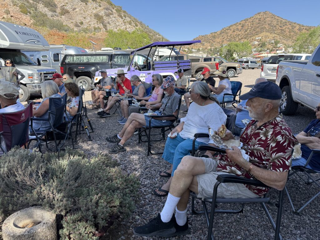 Four Corners Unit Airstream club members eating catered burritos in Bisbee Arizona