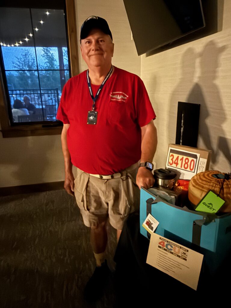 Winner of 4CU charity basket at Airstream Club Region 11 rally in Granby Colorado