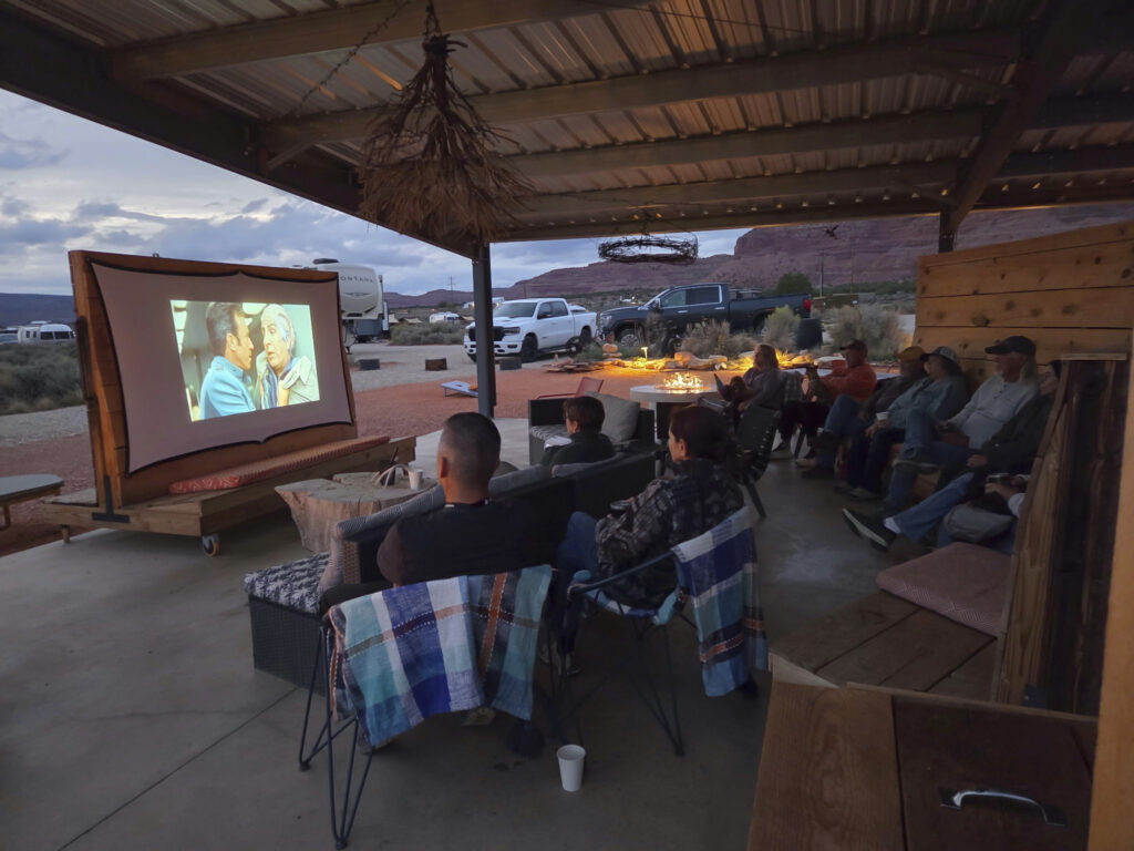 Four Corners Unit members enjoying a movie during an Airstream Club rally in Kanab, Utah
