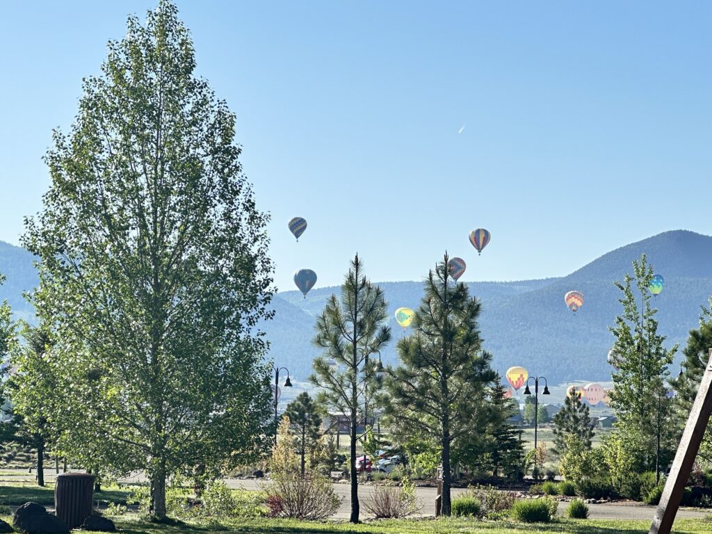 hot air balloons seen taking flight during an airstream club rally at Angel Fire, New Mexico
