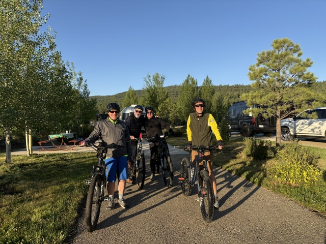 4CU members biked to the launch site of the Balloons over Angel Fire event in June 2026